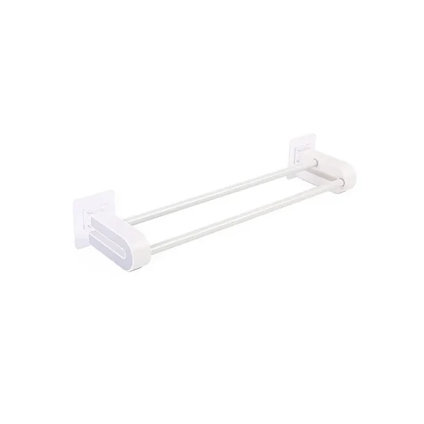  Porte-serviettes mural en plastique blanc fixé sur un mur de salle de bain avec une serviette pliée